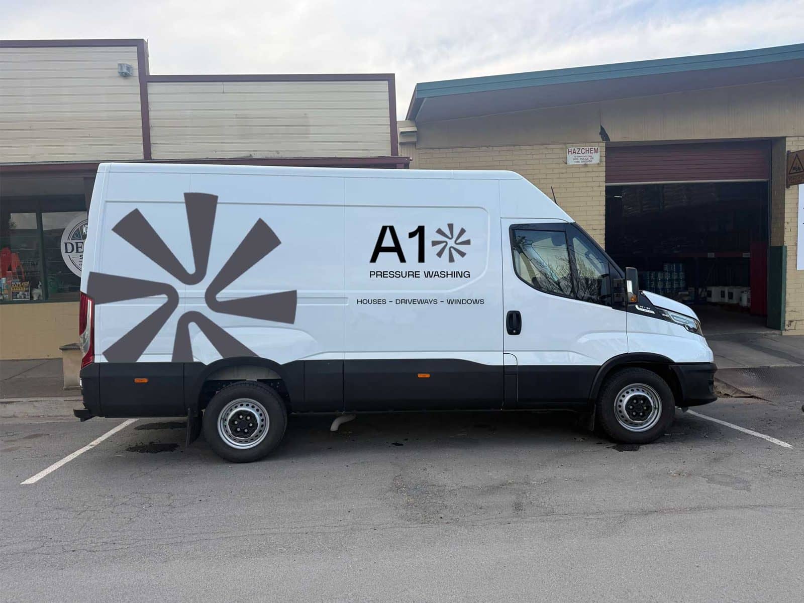 The A1 Pressure Washing team with their van on the Sunshine Coast